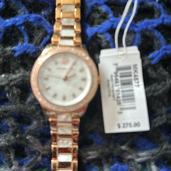 Michael Kors watch. Gold and mother of pearl color. Comes in original box. - Picture 1 of 4